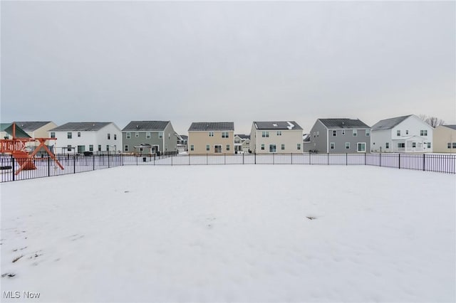 view of yard layered in snow