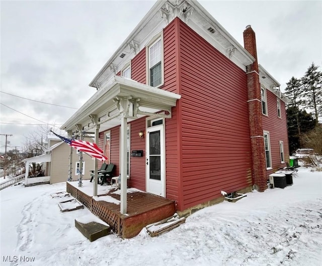 view of snow covered property