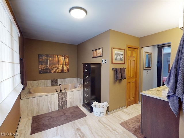 bathroom with tiled tub