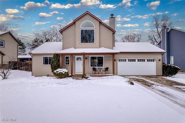 view of front of house featuring covered porch and a garage