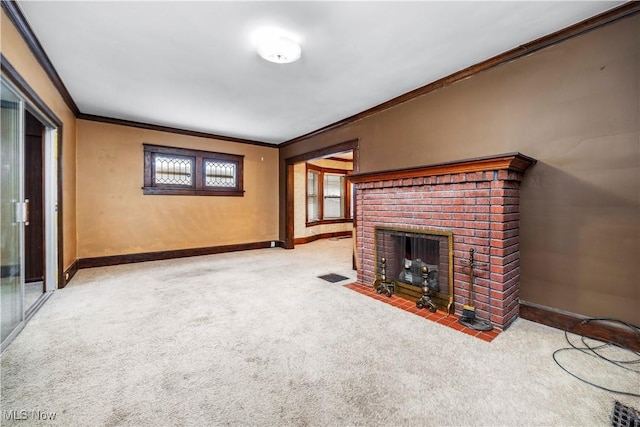 unfurnished living room featuring ornamental molding, a fireplace, and light carpet