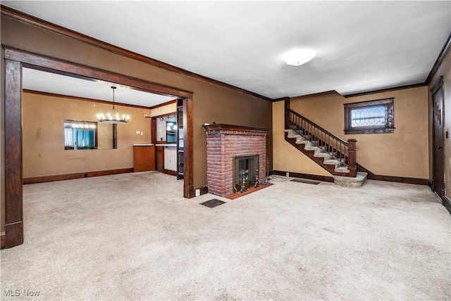 unfurnished living room with carpet, a healthy amount of sunlight, a brick fireplace, and crown molding