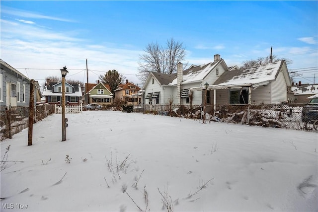 view of yard covered in snow