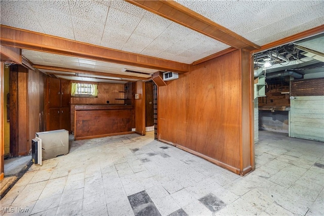 basement with wood walls