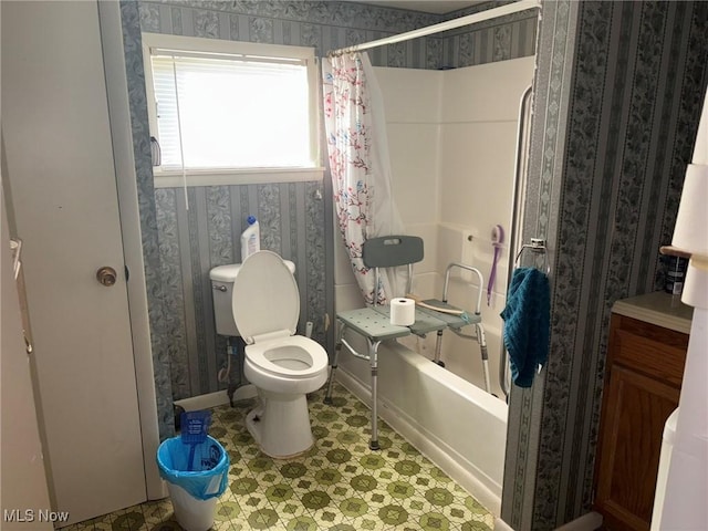 bathroom with shower / tub combo and toilet