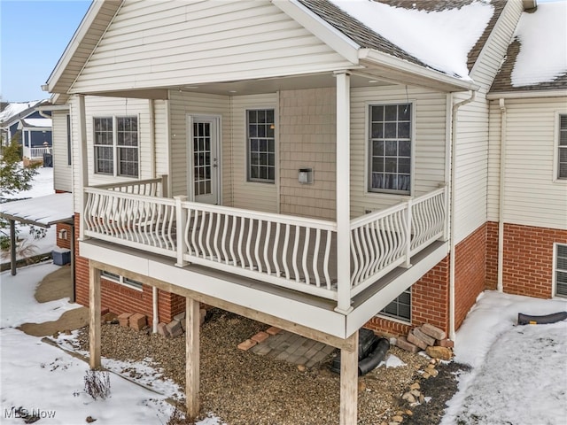 view of snow covered deck