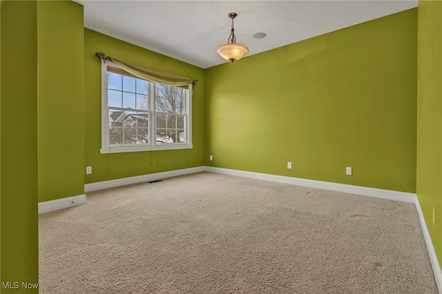 view of carpeted spare room