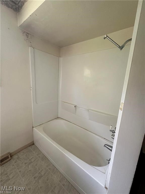 bathroom featuring shower / tub combination