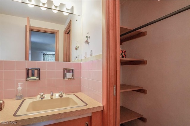 bathroom featuring backsplash and vanity