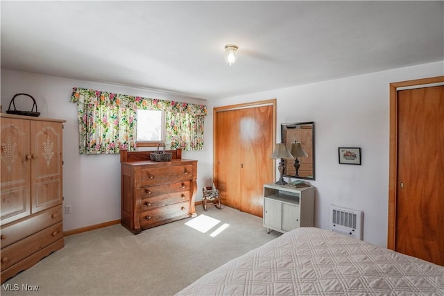 bedroom with light carpet