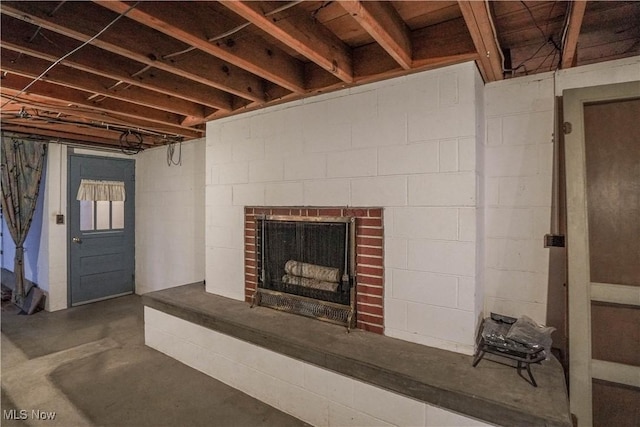 interior space featuring a brick fireplace