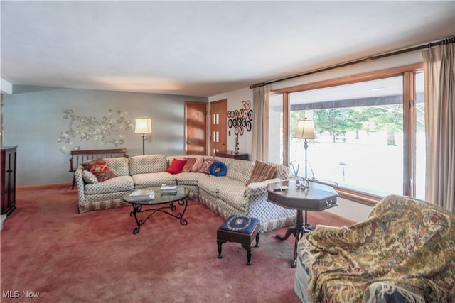 living room with carpet flooring and a healthy amount of sunlight