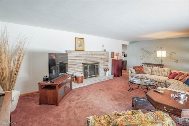 carpeted living room featuring a fireplace