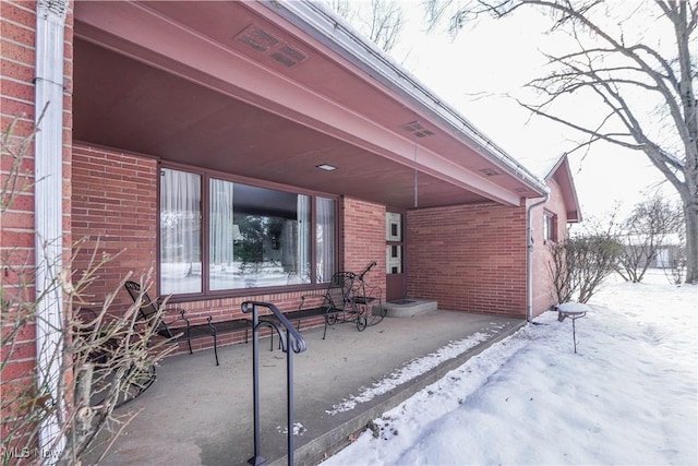 view of snow covered patio