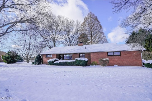 view of snow covered property