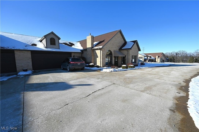 view of side of property featuring a garage