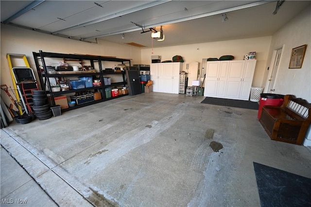 garage featuring a garage door opener