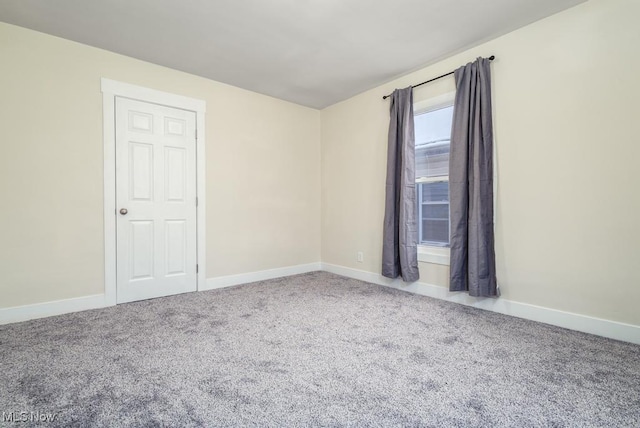 empty room with carpet floors