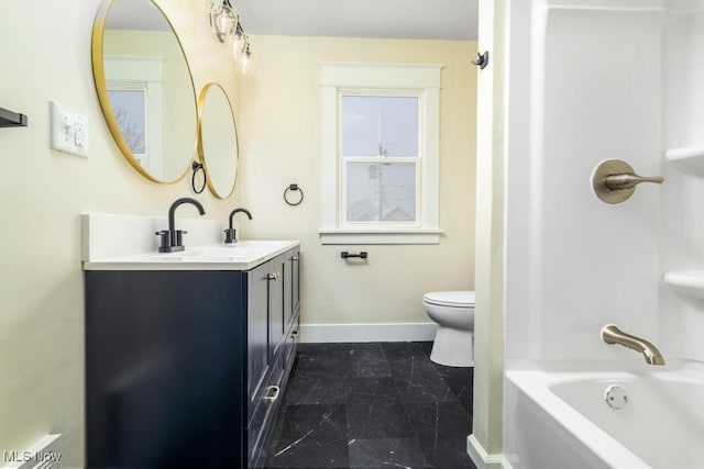 full bathroom with vanity, bathing tub / shower combination, and toilet