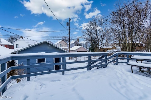 view of snow covered property