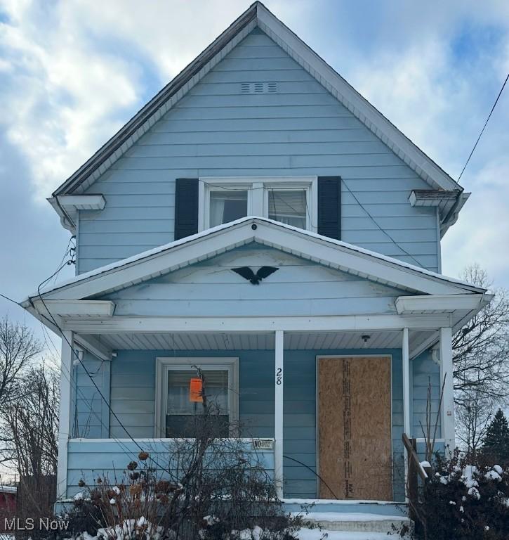 bungalow-style house featuring covered porch