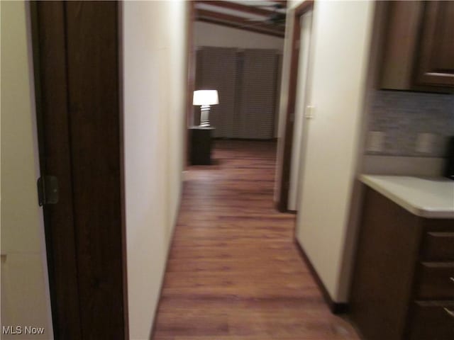 hallway with dark wood-style floors