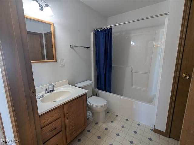 full bathroom with toilet, vanity, and shower / tub combo with curtain