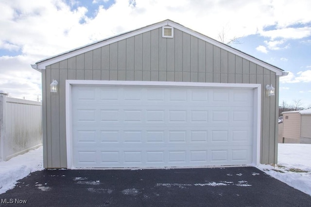 view of snow covered garage