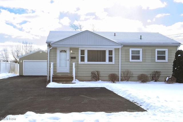 view of front of house featuring an outbuilding and a garage