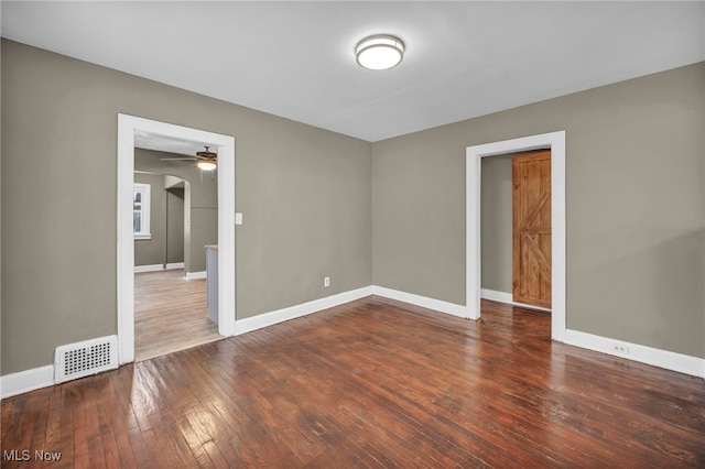 unfurnished room featuring hardwood / wood-style flooring and ceiling fan