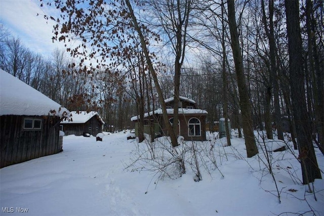 view of yard covered in snow