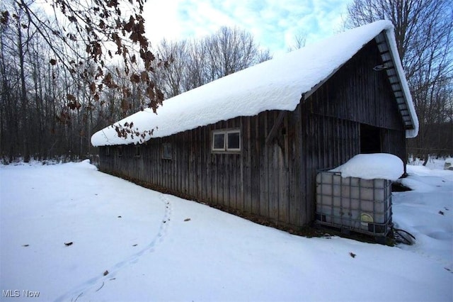 view of snow covered property