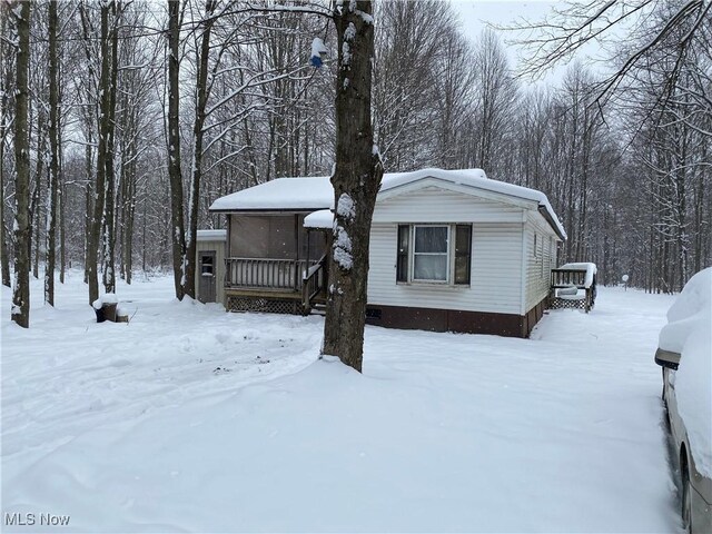 3029 Sweet Rd, Conneaut, OH 44030 - manufactured / mobile home with a view of trees