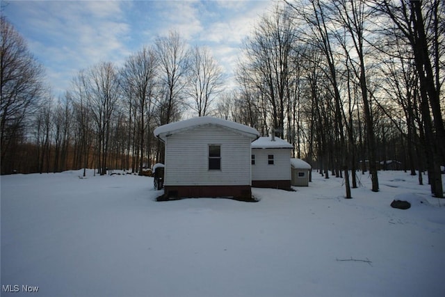 view of snow covered property