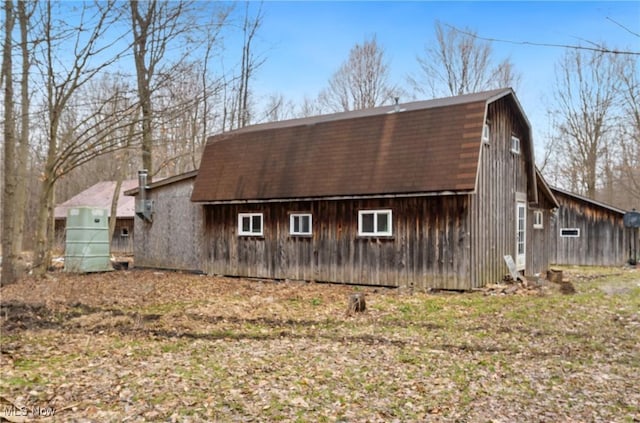 3029 Sweet Rd, Conneaut, OH 44030 - view of home's exterior with a barn, an outdoor structure, and a gambrel roof