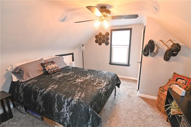 bedroom featuring ceiling fan, carpet floors, and lofted ceiling