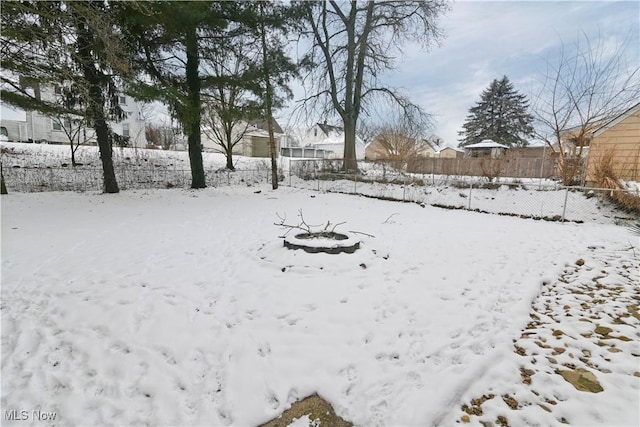 view of yard covered in snow