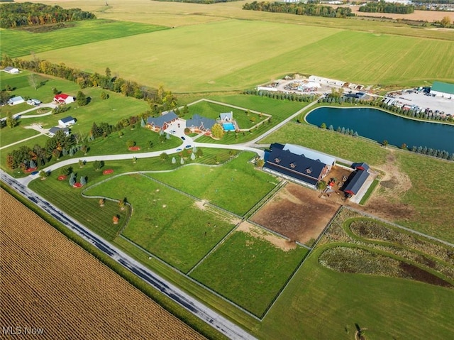 aerial view with a rural view and a water view