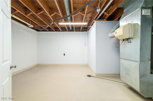 basement featuring heating unit