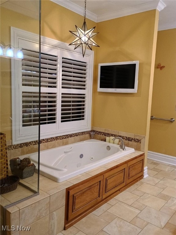 bathroom with a notable chandelier, ornamental molding, and tiled bath