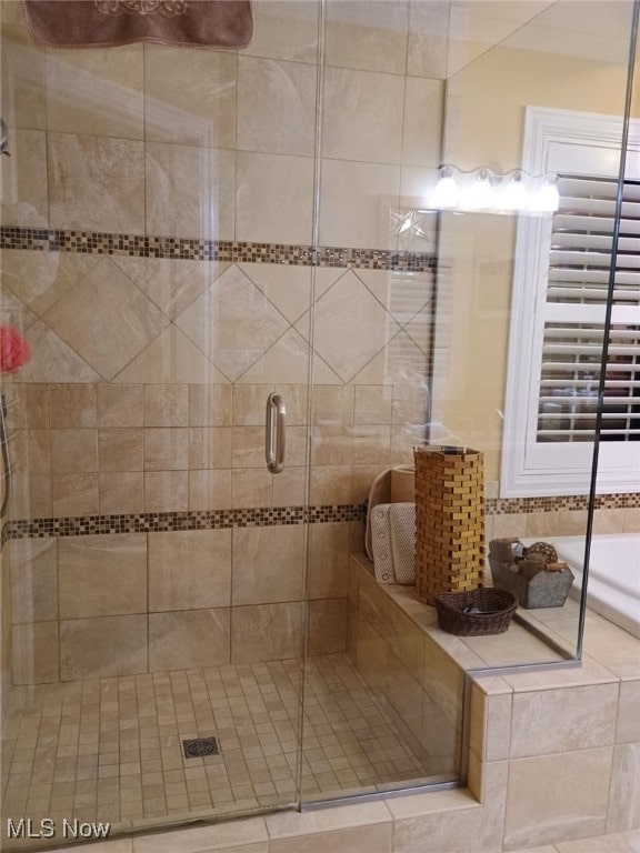 bathroom with an enclosed shower