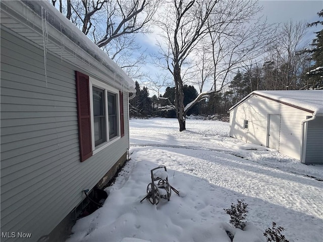 view of yard covered in snow