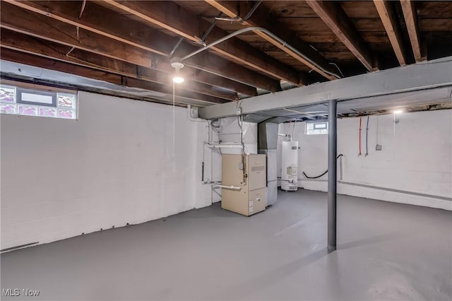 basement with heating unit and water heater