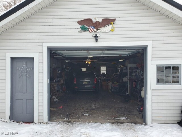 view of snow covered garage