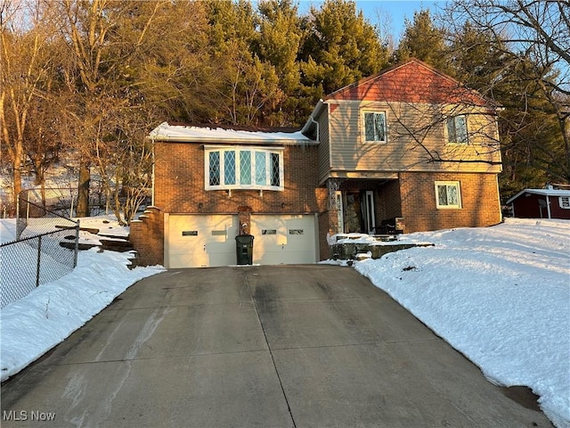 view of front of home with a garage