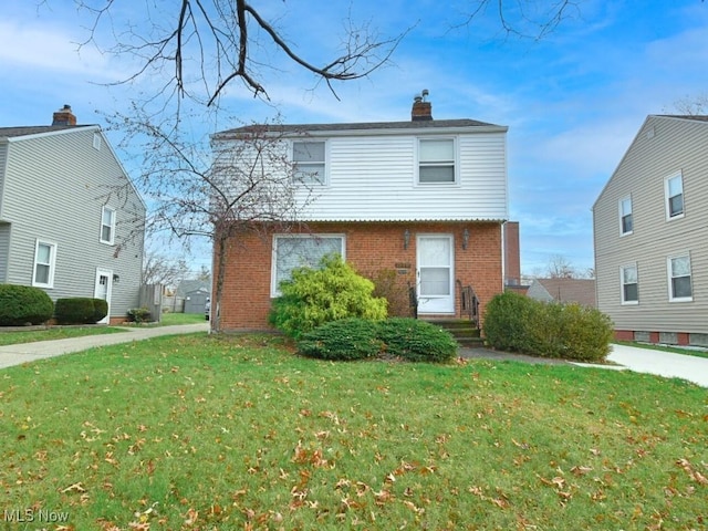 front facade featuring a front lawn