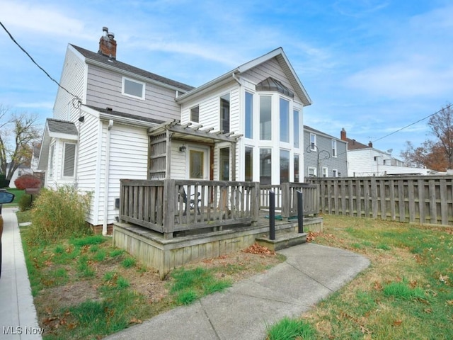 view of front facade featuring a deck