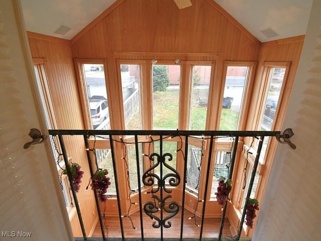 interior space featuring a wealth of natural light and vaulted ceiling