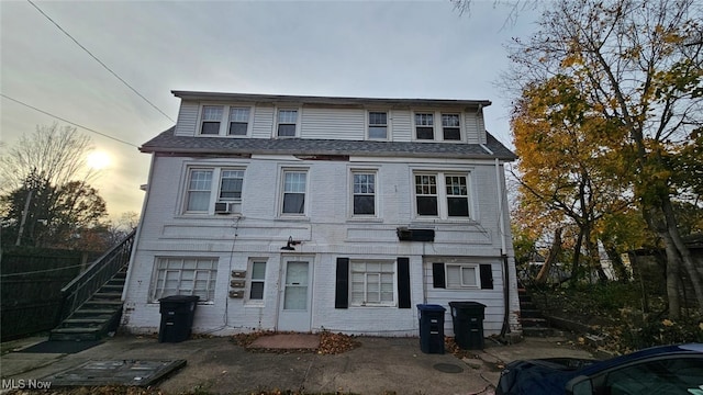 view of front of home featuring cooling unit