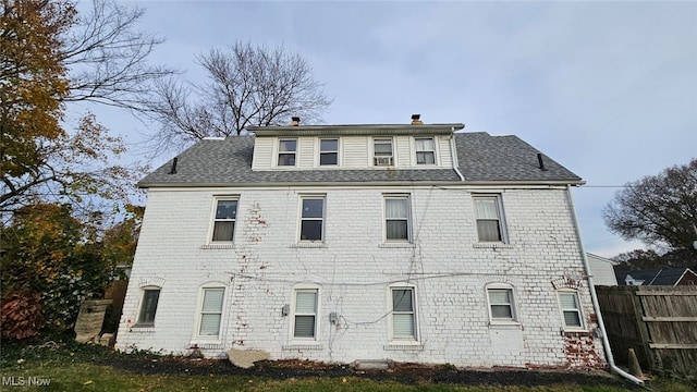 exterior space featuring a front lawn